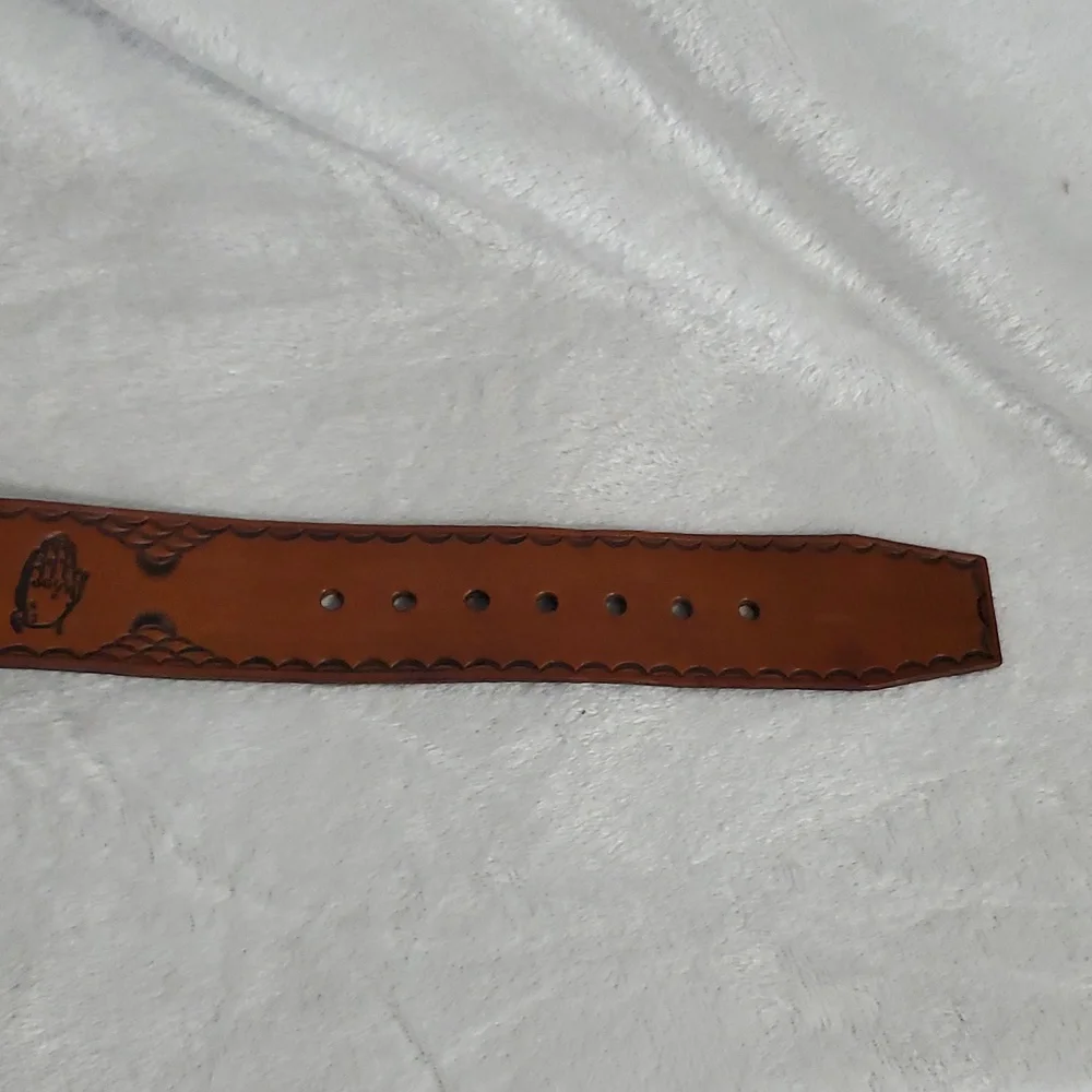 Vintage Leather Belt With Eagle Buckle and Details Embossed Along the Strap.